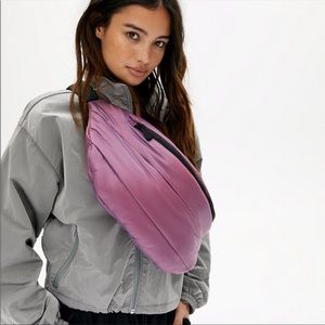 TNA Super Puff Iridescent waist bag